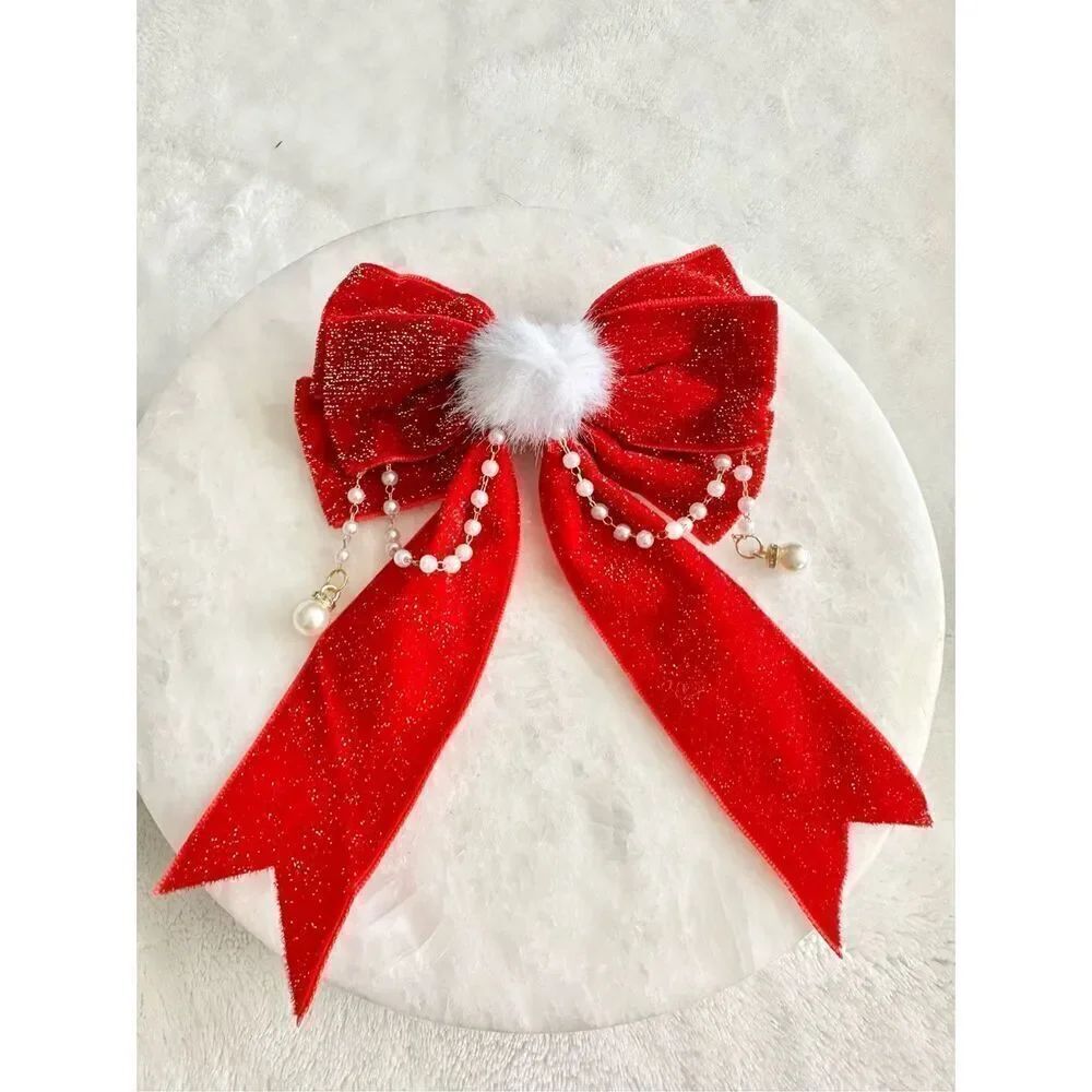Bright red Christmas pom-pom with pearl detail bow ￼